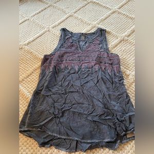 Blueish gray top with purple tribble print. Size small.